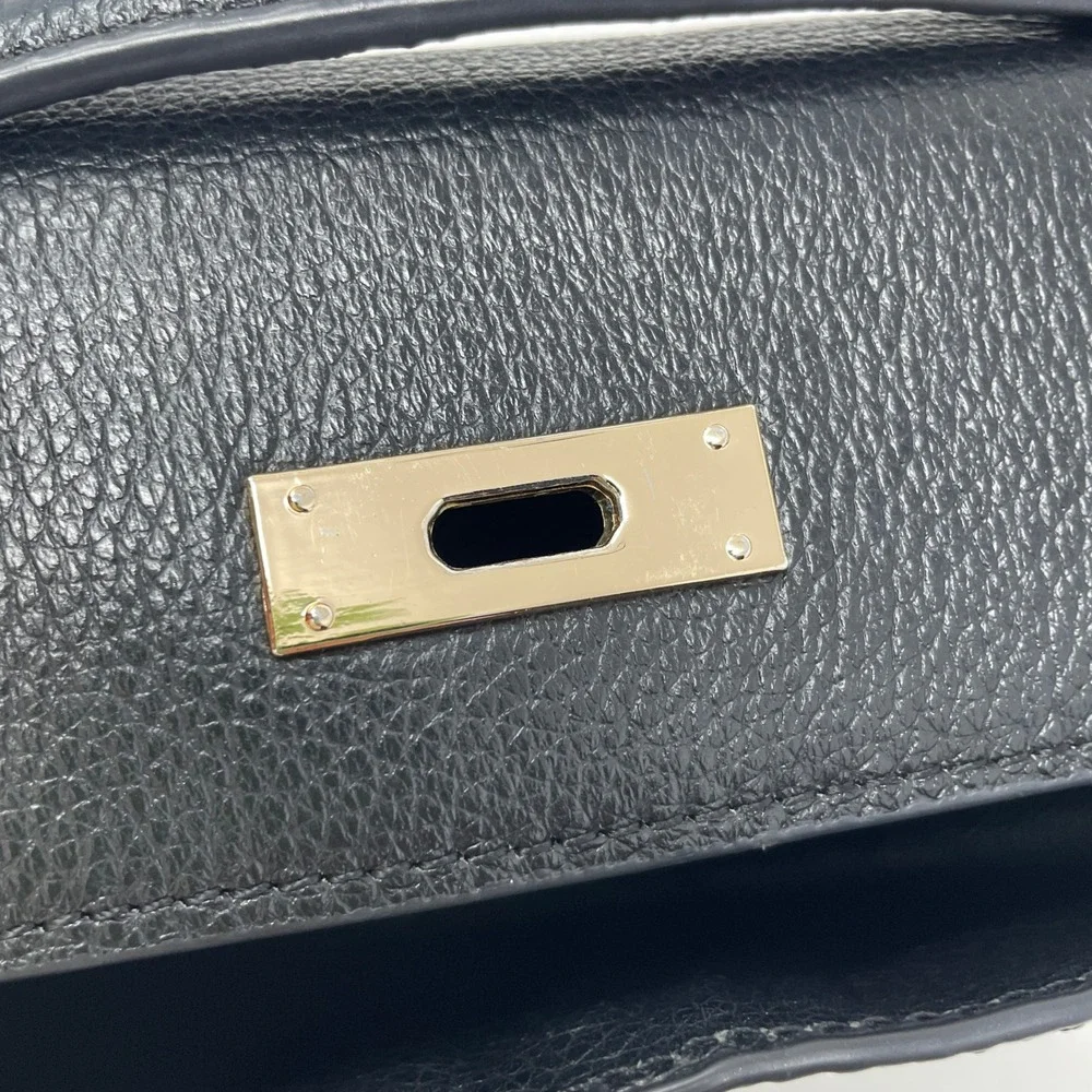 Zenith Black Pebbled Leather Clutch Bag Gold Turn Lock Hardware Handle Handbag